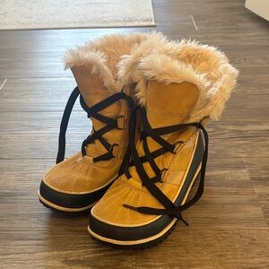 Sorel Tan and Black Winter Boots